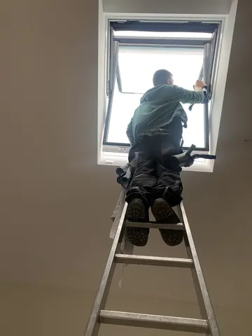 Reinigung eines Dachfensters